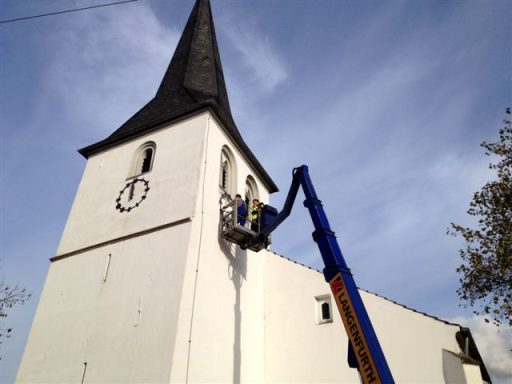 Reparatur der Uhr am Turm
